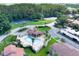Complex pool and tennis courts viewed from above at 4611 Gate Pl # H-203, Orlando, FL 32811