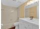 Updated bathroom with new vanity, bathtub, and fixtures at 4611 Gate Pl # H-203, Orlando, FL 32811