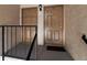 Exterior view of two condo building entrances at 4611 Gate Pl # H-203, Orlando, FL 32811