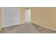 Cozy bedroom with ample closet space and neutral tones at 4611 Gate Pl # H-203, Orlando, FL 32811