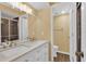 Modern bathroom with double vanity and updated fixtures at 4611 Gate Pl # H-203, Orlando, FL 32811
