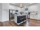 Modern kitchen with white cabinets, stainless steel appliances, and an island at 2195 Bluebird Pl, St Cloud, FL 34771