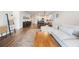 Open concept living room with hardwood floors and a neutral color palette at 2195 Bluebird Pl, St Cloud, FL 34771