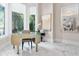 Built-in home office with a unique curved desk and ample natural light at 5126 Fairway Oaks Dr, Windermere, FL 34786