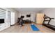 Home gym with Peloton bike, treadmill, and weights at 5126 Fairway Oaks Dr, Windermere, FL 34786