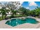 Inviting pool with a spa and patio, offering serene views at 5126 Fairway Oaks Dr, Windermere, FL 34786