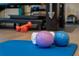 Yoga mats and exercise balls in home gym at 5126 Fairway Oaks Dr, Windermere, FL 34786