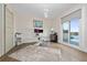 Home office with lake view and built-in desk at 5126 Fairway Oaks Dr, Windermere, FL 34786