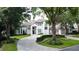Stunning two-story home with a beautifully landscaped yard at 5126 Fairway Oaks Dr, Windermere, FL 34786