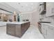 View of kitchen island and cabinetry with high-end appliances at 5126 Fairway Oaks Dr, Windermere, FL 34786