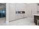 Modern kitchen featuring extensive cabinetry and high-end appliances at 5126 Fairway Oaks Dr, Windermere, FL 34786