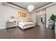 Luxurious main bedroom with plush bedding and a large window offering natural light at 5126 Fairway Oaks Dr, Windermere, FL 34786