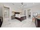 Spacious bedroom with hardwood floors and ensuite bathroom at 5126 Fairway Oaks Dr, Windermere, FL 34786