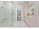 Clean bathroom with a large shower and double vanity at 5126 Fairway Oaks Dr, Windermere, FL 34786