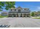 Two-story home with screened porch and landscaping at 3105 Pastures Rd, Kissimmee, FL 34746