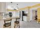 Modern kitchen with granite countertops and breakfast bar at 3105 Pastures Rd, Kissimmee, FL 34746