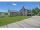 House exterior showcasing a side view, screened porch and yard at 3105 Pastures Rd, Kissimmee, FL 34746