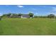 Spacious backyard with lush green grass, providing ample outdoor space at 3105 Pastures Rd, Kissimmee, FL 34746