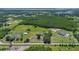 Aerial view of property with large lot and pond at 3105 Pastures Rd, Kissimmee, FL 34746