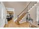 Bright entryway with hardwood floors and elegant staircase at 3105 Pastures Rd, Kissimmee, FL 34746