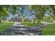 Two-story house with a long driveway and lush landscaping at 3105 Pastures Rd, Kissimmee, FL 34746