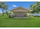 Detached garage with covered parking and ample storage at 3105 Pastures Rd, Kissimmee, FL 34746