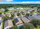 Community overview showcasing various homes and landscaping at 133 Andalusia Loop, Davenport, FL 33837