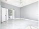 Spacious bedroom with marble floors and ensuite bathroom access at 133 Andalusia Loop, Davenport, FL 33837