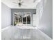 Bedroom with pool view and sliding glass doors at 133 Andalusia Loop, Davenport, FL 33837