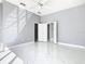 Bright bedroom with marble floors and double door closet at 133 Andalusia Loop, Davenport, FL 33837