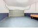 Garage with foosball table and extra storage at 133 Andalusia Loop, Davenport, FL 33837