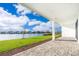 Spacious backyard with paver patio overlooking a lake at 9752 Laurel Berry Dr, Orlando, FL 32827