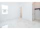 Bright bedroom with marble floors and walk-in closet at 9752 Laurel Berry Dr, Orlando, FL 32827