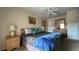 Spacious bedroom with king-size bed and plenty of light at 2716 Bushman Dr, Kissimmee, FL 34746