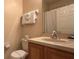 Clean bathroom with single sink vanity and shower/tub combo at 2716 Bushman Dr, Kissimmee, FL 34746