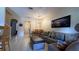 Spacious living room with dining area and access to kitchen at 2716 Bushman Dr, Kissimmee, FL 34746