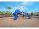 Community playground with a slide and climbing structure at 10556 Salt Grove St, Orlando, FL 32824