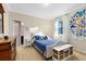 Cozy bedroom with a double bed and ample closet space at 3425 Halsway Dr, Orlando, FL 32824
