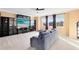 Spacious Gathering room with large TV and built-in shelving at 3425 Halsway Dr, Orlando, FL 32824