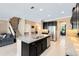 Spacious kitchen with granite countertops, stainless steel appliances, and an island at 3425 Halsway Dr, Orlando, FL 32824