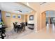 Formal dining room with a table for six and access to the foyer at 3425 Halsway Dr, Orlando, FL 32824