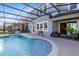 Resort style screened pool and spa with covered patio at 3425 Halsway Dr, Orlando, FL 32824