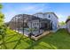 Expansive backyard with a pool, spa, and lush landscaping at 3425 Halsway Dr, Orlando, FL 32824