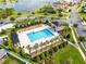 Community pool with lounge chairs and a pergola at 3425 Halsway Dr, Orlando, FL 32824