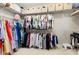 Large walk-in closet with ample hanging and shelving space at 3425 Halsway Dr, Orlando, FL 32824