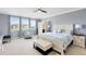 Spacious primary bedroom with ensuite bath and sitting area at 3425 Halsway Dr, Orlando, FL 32824