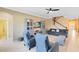 Relaxing living room with two armchairs, sofa, and built-in entertainment center at 3425 Halsway Dr, Orlando, FL 32824
