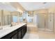 Bathroom with double vanity, soaking tub, and shower at 3425 Halsway Dr, Orlando, FL 32824