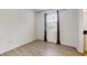 Charming bedroom with wood-look floors and window with curtains at 14315 Swanley St, Orlando, FL 32832
