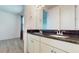 Double vanity bathroom with granite countertop at 14315 Swanley St, Orlando, FL 32832